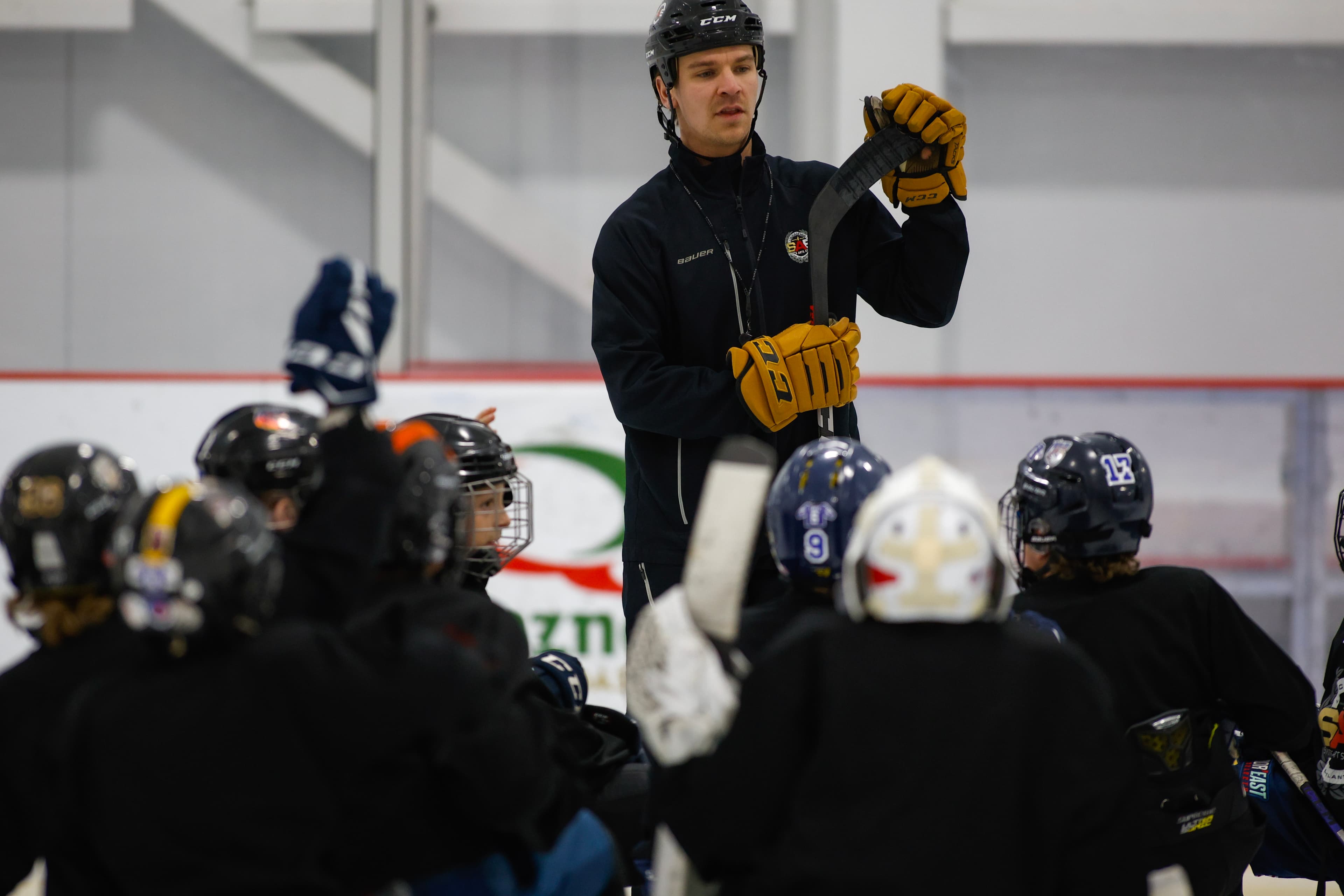 SAE Academy hockey coach